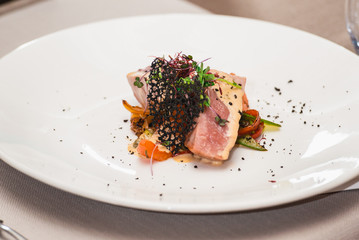 delicious tuna in a restaurant. small portion