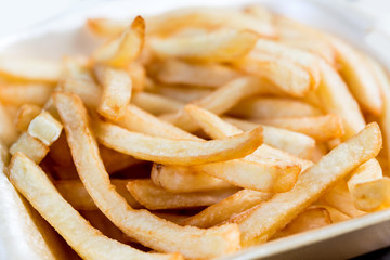 Golden French fries potatoes ready to be eaten