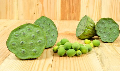 Lotus seed green on wooden background