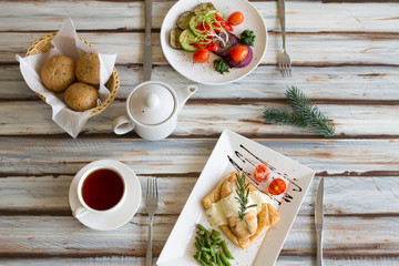 Dinner fish meal on a wooden table