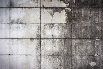 Old concrete block wall background and texture