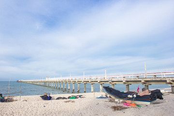 Fototapeta na wymiar Bridge pier extending into the sea