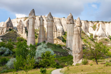 Unique geological formations in Love valley, Goreme village, Cappadocia, Turkey.