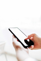 Woman using mobile smartphone. Modern or business concept. Close-up corporate smartphone approach.