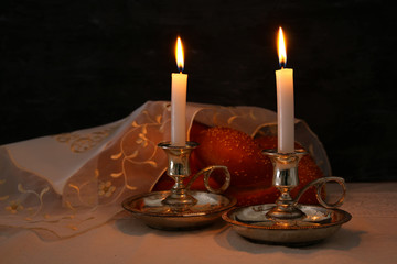 shabbat image. challah bread, shabbat wine and candelas