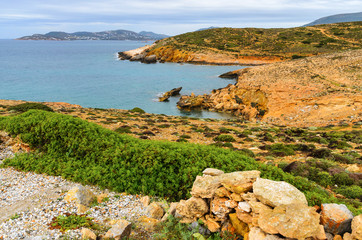 Fototapeta na wymiar Rocky coast on the west side of Paros Island, Cyclades. Greece.