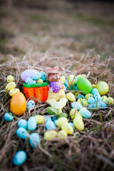 Easter eggs and cute bunny in grass. Festive decoration for a Happy Easter.