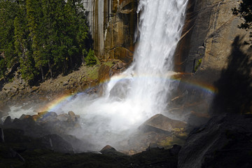 Vernal Fall waterfall with rainbow, along the Merced River, Yosemite National Park, California