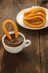 Photo of churros con chocolate, traditional Spanish dessert