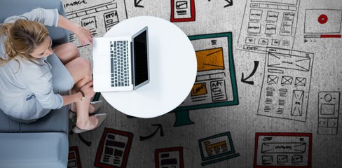 Composite image of woman on her laptop