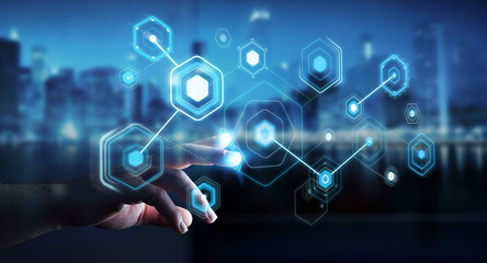 Businessman using digital screens with holograms datas 3D rendering