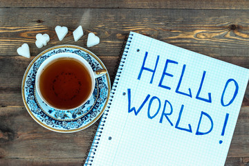 Porcelain cup of tea on a wooden background