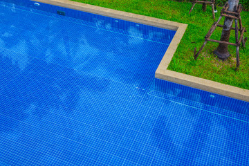 Beautiful Swimming pool in hotel pool resort .