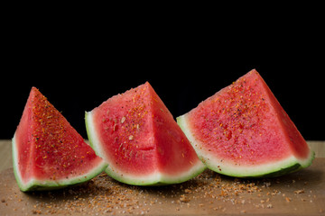 Seedless watermelon pieces with chili powder