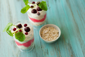 Berry dessert, smoothies with oatmeal, yogurt and cream. The concept of a healthy diet