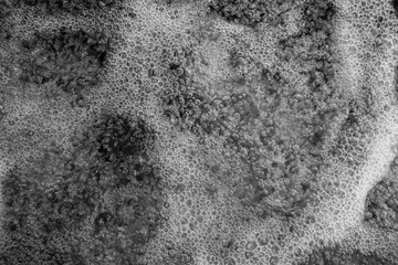 Rough water in close up with lots of bubbles
