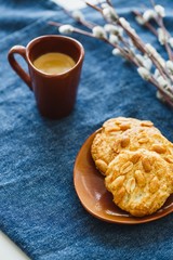 A cup of espresso on a table with cookies