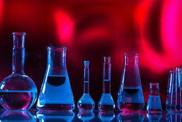 Science laboratory research and development concept. microscope with test tubes