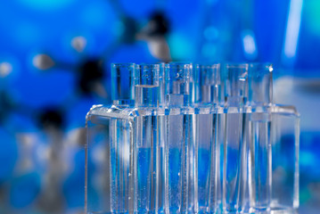 Science laboratory research and development concept. microscope with test tubes