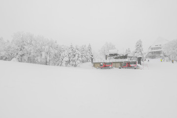 Ski lift over snow mountain in ski resort .