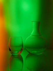 Still life with a glass and a decanter