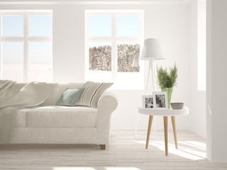 White room with sofa and winter landscape in window. Scandinavian interior design. 3D illustration