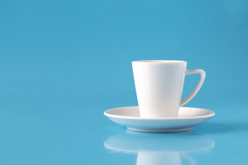 cup of coffee on blue