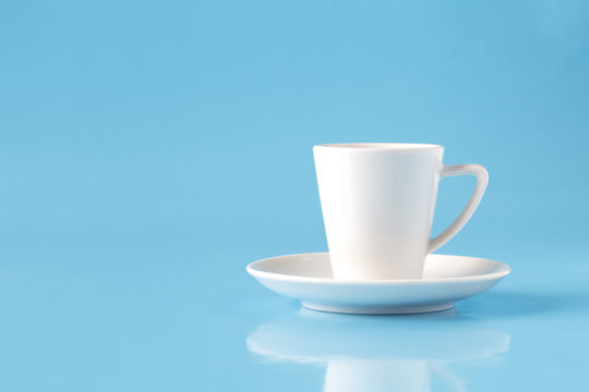 coffee cup over blue background
