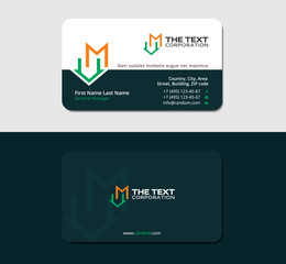 dark green business card with letter M and mansion