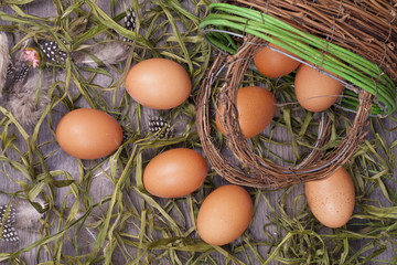 Fresh eggs on a wooden base