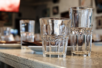 Empty juice glasses on the table