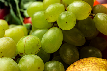 Green grapes without pits close-up macro photo