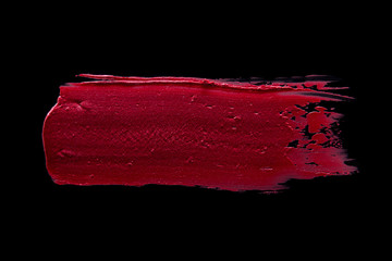 lipstick smudge isolated black background 