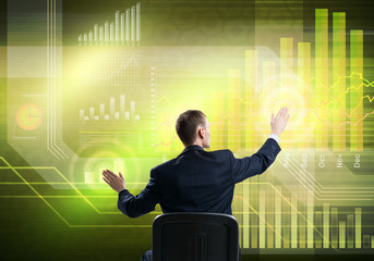 Businessman using media interface