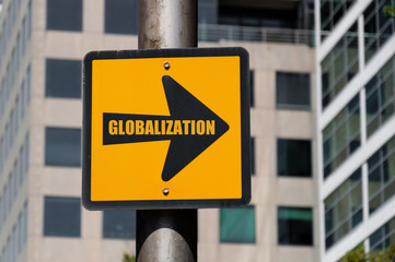 Directional sign with conceptual message GLOBALIZATION