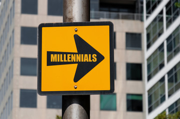 Directional sign with conceptual message MILLENNIALS
