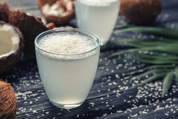 Beautiful composition with coconut water on table
