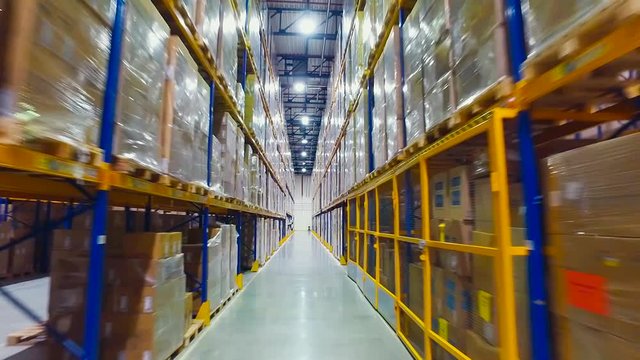 Aerial Footage Forklift Trucks Loads In The Rack Inside warehouse