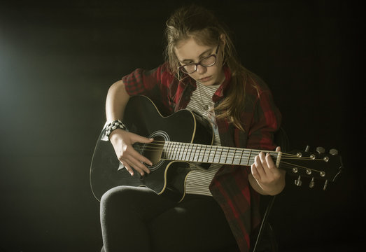 Teenager with guitar