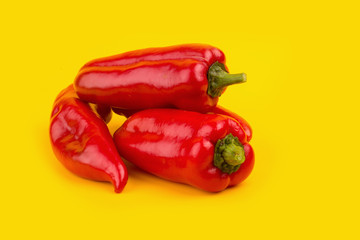 red chilli vegetable Isolated on yellow background