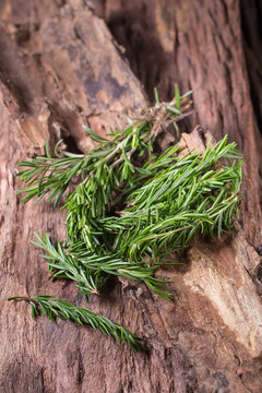 rosemary Herbs and Medicinal herbs. Organic healing herbs. fresh rosemary bunch rosemary on wooden background