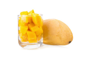 Mango fruit and mango cubes on the white background