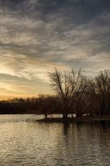 Sunrise over a lake near the Des Moines river