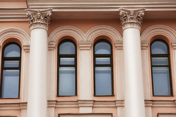 Arched windows with decorated wall background