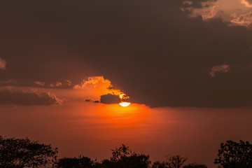 Colorful dramatic sky with cloud at sunset.Sky with sun background.
