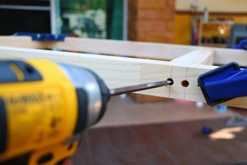 Assembling furniture, clamping and perforating