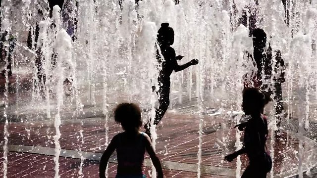 Kids Play Water Jets Urban Downtown City Fountain Summer South