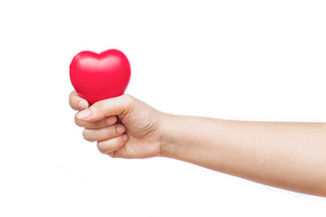 Obraz premium hand holding a red heart on white background