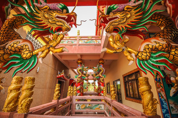 Golden dragon in Chinese shrine