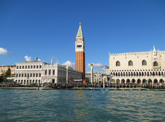Fototapeta na wymiar The Doge’s Palace and the Bell Tower Campanile as seen from Grand Canal of Venice, Italy 